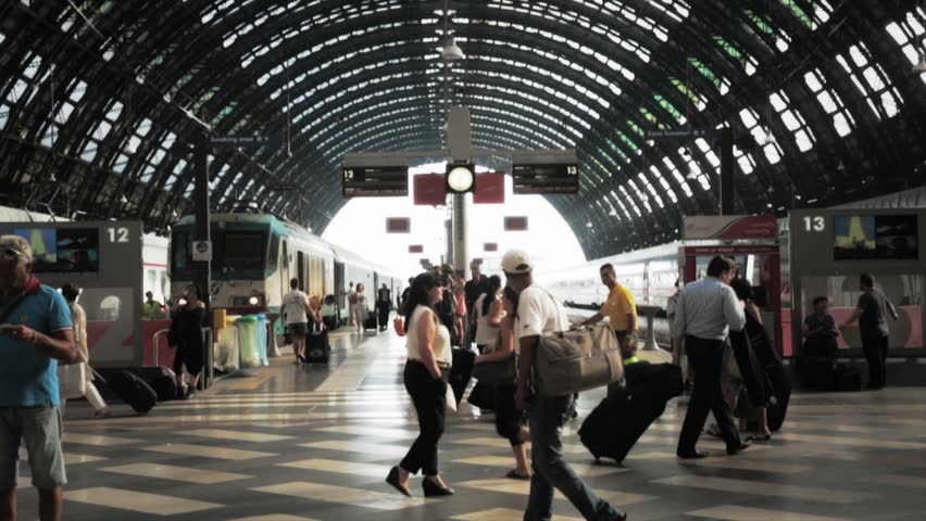 ITALY, MILAN - CIRCA JULY 2012: People departing from Central Station