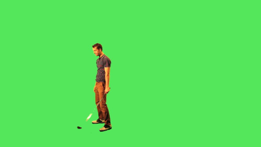 Young male playing golf
