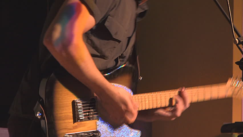 rock musician playing electric guitar HD