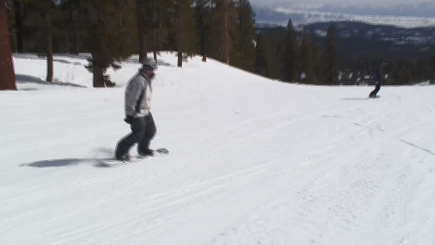 Close-Up View Of Snowboarder Rider
