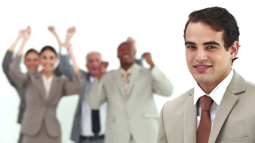 Business team celebrating success against a white background