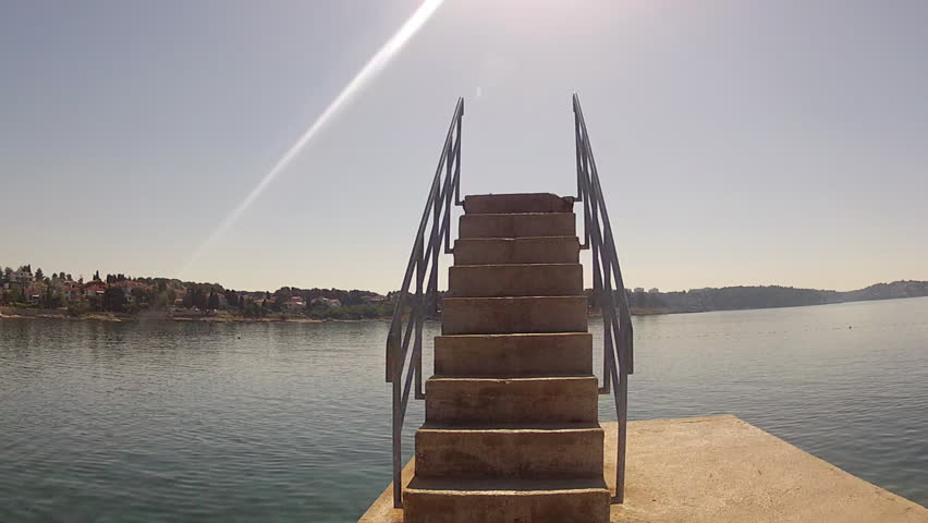 Jumping at sea

Description: Jumping at the sea from an old diving tower

