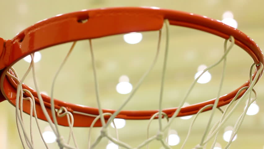 closeup, scoring basket in basketball court