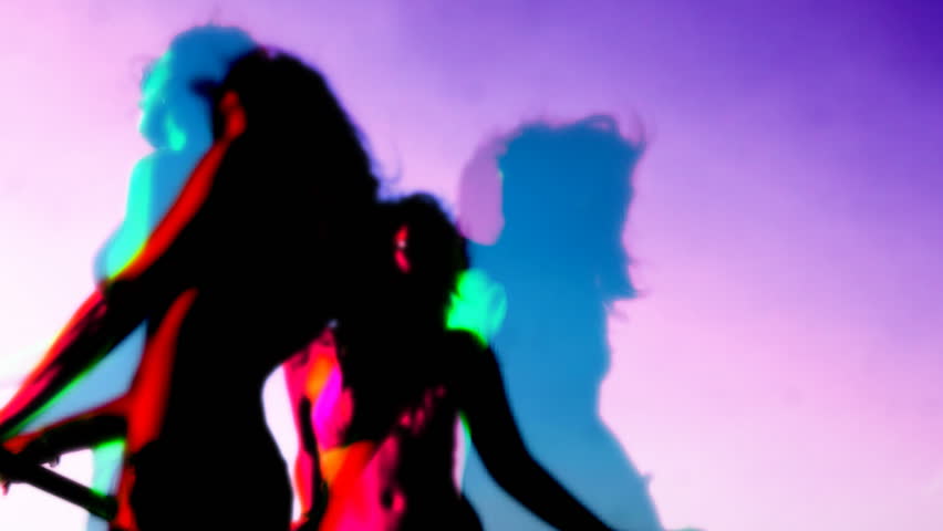 girls dancing with overlayed trails of the same footage