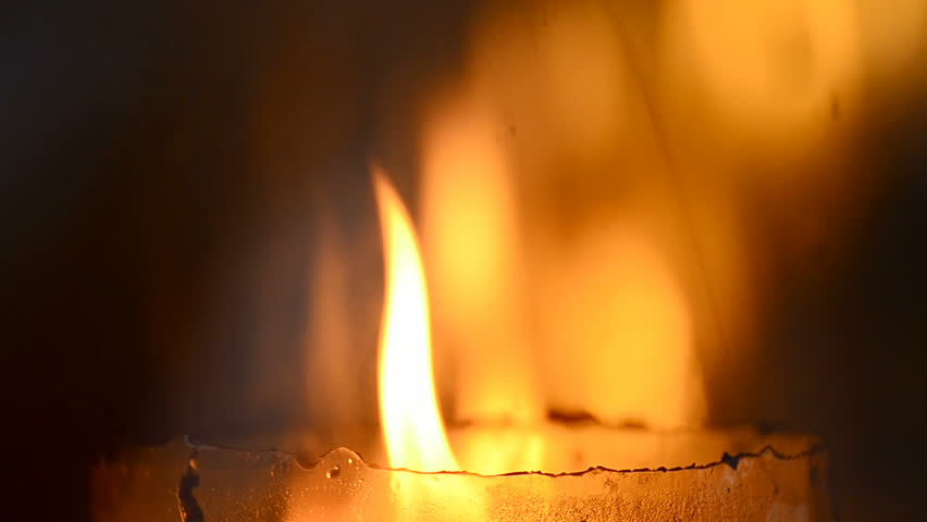 Golden light of candle flame in Chinese Vegetarian Festival