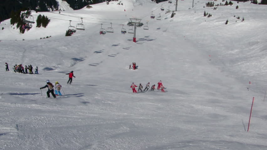  PORTES DU SOLEIL, FRANCE - FEB 28 - 	Ski school heads down the slopes 		on Feb 28, 2012 near Avoriaz, in the Portes du Soleil, France
