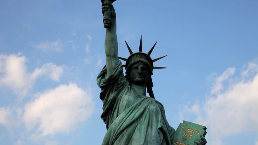 TOKYO, JAPAN â NOVEMBER 10: Statue of Liberty replica at Odaiba, overlooking the Rainbow Bridge in Tokyo Bay November 10, 2011