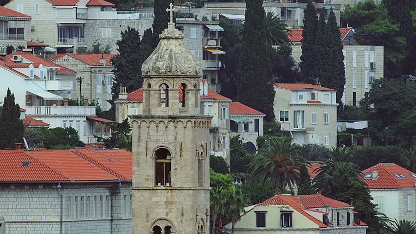 Dubrovnik old city with bell tower of Dominican convent, Croatia. Walls detail.