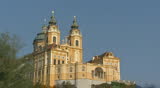 MELK, WACHAU VALLEY, AUSTRIA - AUGUST 2009: frogview + tilt up entrance historic building Stift Melk, a Benedictine abbey.  Stift Melk is located in the Wachau region in Austria.
