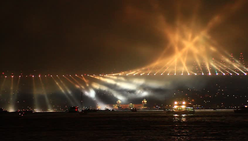 Running lights over Bosporus Bridge on October, 29 Festival Day in Istanbul, Turkey. Light Show with Republic Day March
