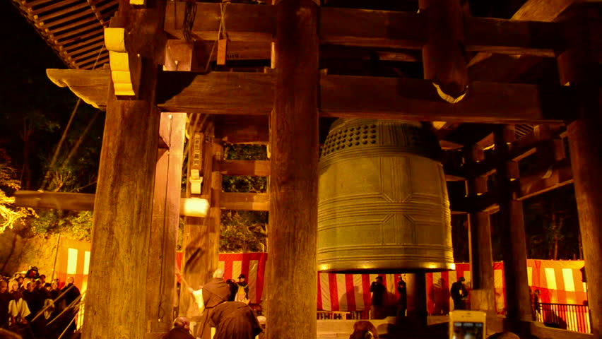 Kyoto - January 2012: Temple Bell Ringing At Chion-in In Kobe At New Years Eve With Monks On