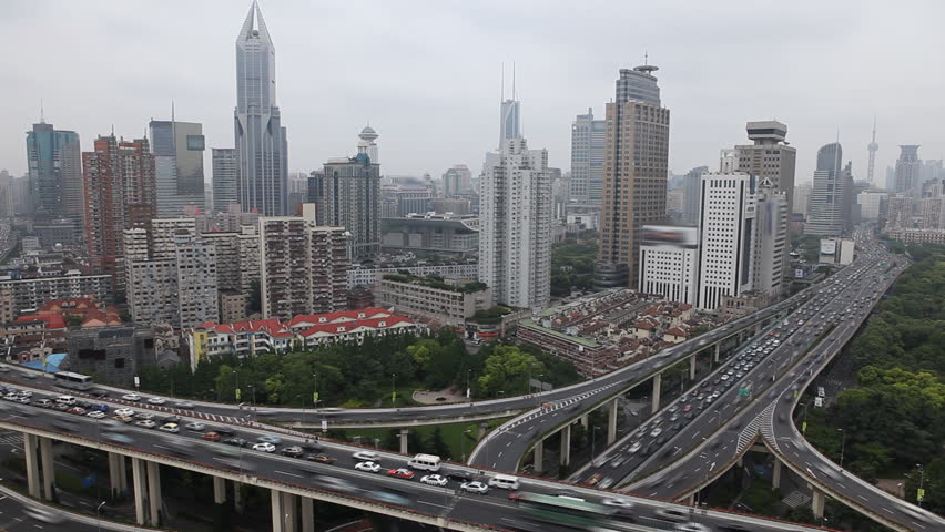 Aerial View of Shanghai Skyline, China, Yan'an East Road Overpass, blurred logos, time lapse