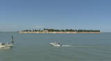 VENICE, ITALY - MAY 2009: Venetian lagoon with cemetery Isle of San Michele viewed from the main island