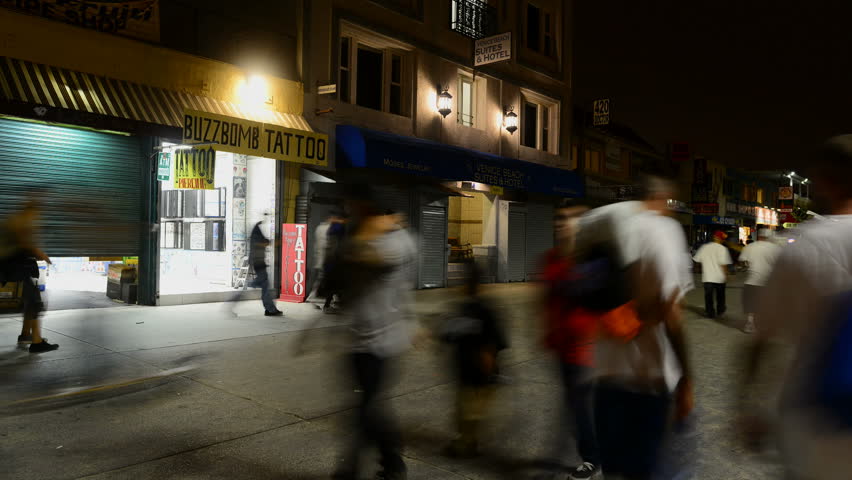 VENICE, CA - CIRCA OCT 2012: Time lapse of pedestrians walking along the Venice, California boardwalk circa October 2012.