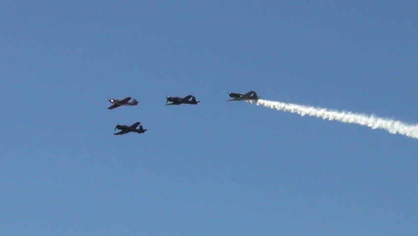 MIAMI - NOVEMBER 3, 2012: Propeller airplanes practice formation flying ahead of the Wings Over Homestead Airshow in Miami on November 3, 2012