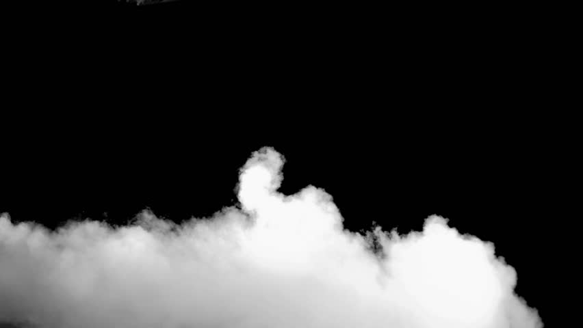 White smoke in super slow motion appearing against a black background