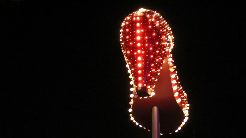 LAS VEGAS, NEVADA - JANUARY 4: Lit up high heel shoe spinning on Fremont Street, Las Vegas, Nevada on January 4, 2012 