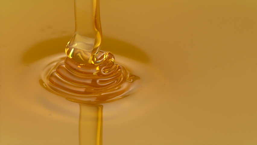 Honey pouring on honey shooting with high speed camera.