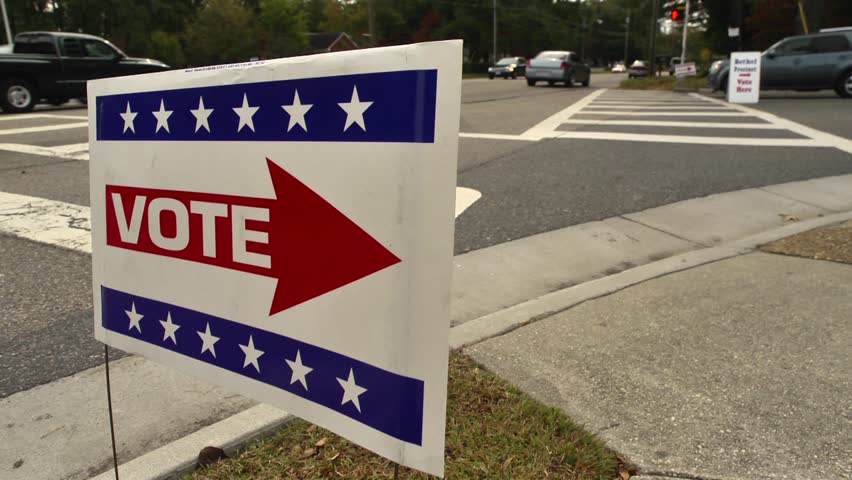 Voting precinct sign points the way for motorists.