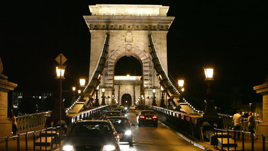 BUDAPEST, HUNGARY - JUNE 10: Night traffic of cars on Secheni Bridge through Danube, on June 10, 2012 in Budapest, Hungary. Budapest by quantity of  population takes  ninth place in the European union 