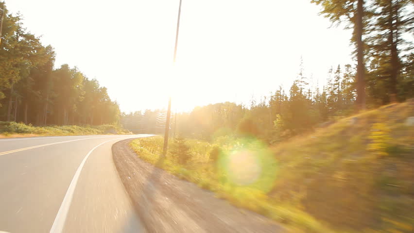 Summer drive with sun going down. Haliburton, Ontario, Canada.
