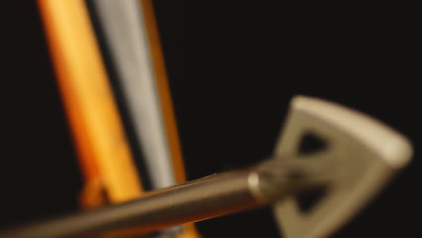 Archery Hunting vintage broadhead and longbow.