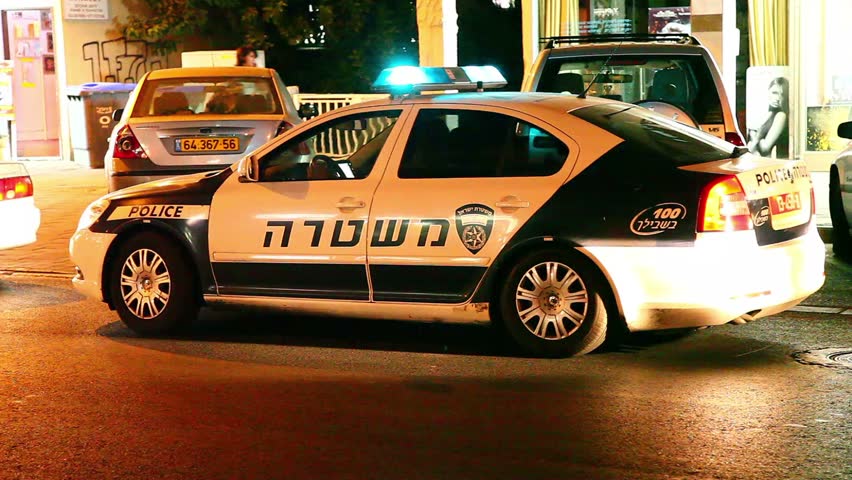 TEL AVIV, ISRAEL - NOVEMBER 20: A police car with the siren moves on the street on November 20, 2012 in Tel Aviv, Israel.