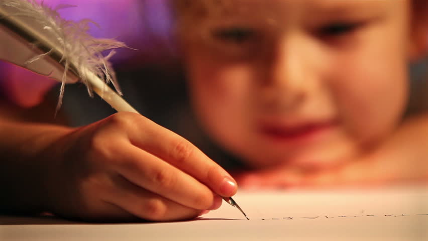 Girl writing with quill pen. Xmas concept