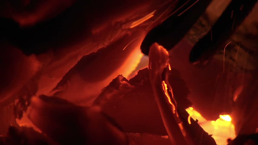 Fire with ember burning in furnace slow motion
