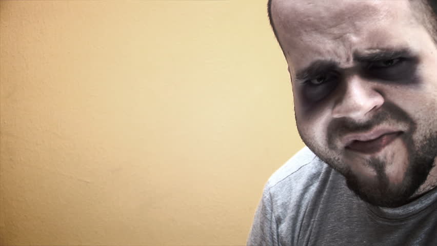 Mutated man waving his head in "no-no" manner
