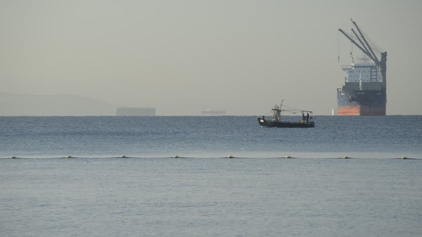 Fishing boat is moving to its hidden spot, red Sea, Eilat, Israel