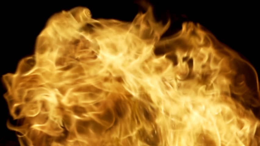 Huge, frame-filling slow motion flames and sparks, roiling and twisting.