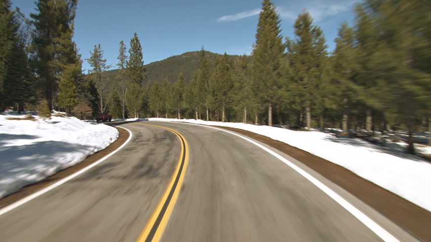 Driving plate point of view shot in California mountains, west of Mt. Shasta City, California, by Lake Siskiyou.