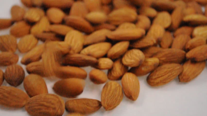 footage of falling almond seeds