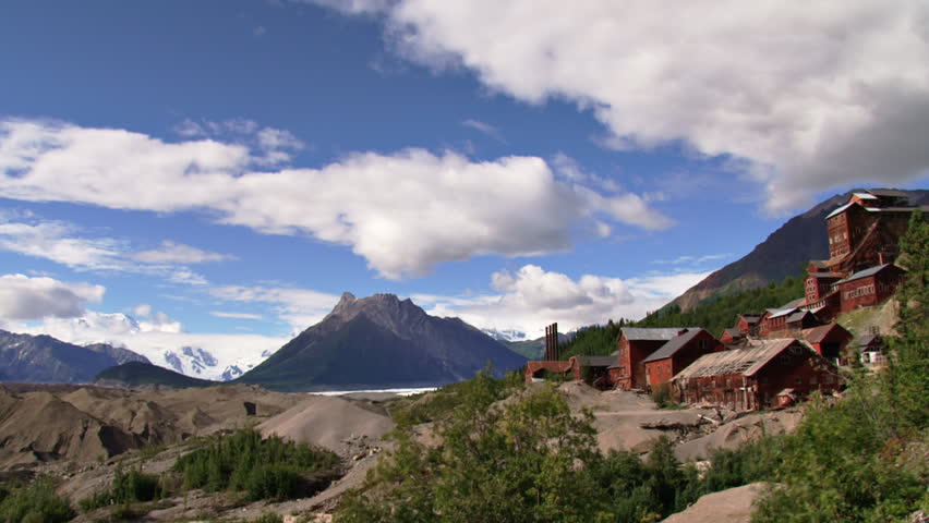 Time lapse shot taken in Wrangell-St. Elias National Park looking north over the Kennicott Glacier (mounds to the left) and the Kennecott Mine 