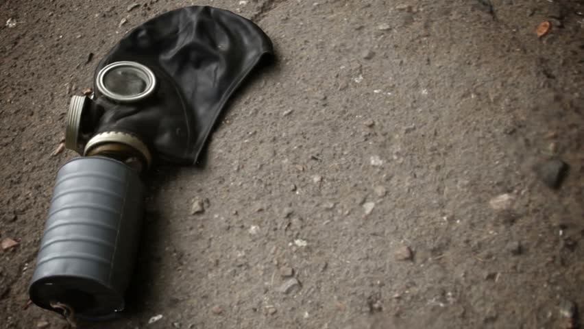 Gasmask on the pavement
