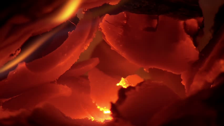Fire with ember burning in furnace slow motion
