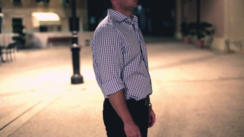 Young man waiting for somebody in the restaurant, evening
