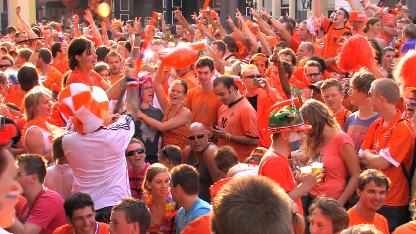 GRONINGEN, HOLLAND - JULY 11: Dutch soccer fans supporting their team during the final of the FIFA World Cup 2010 Netherlands vs. Spain - July 11, 2010 in Groningen, the Netherlands.