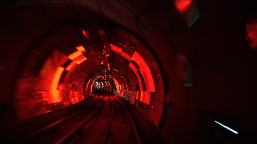 The Bund sightseeing tunnel goes under the Huangpu River, slow shutter speed, China, Shanghai