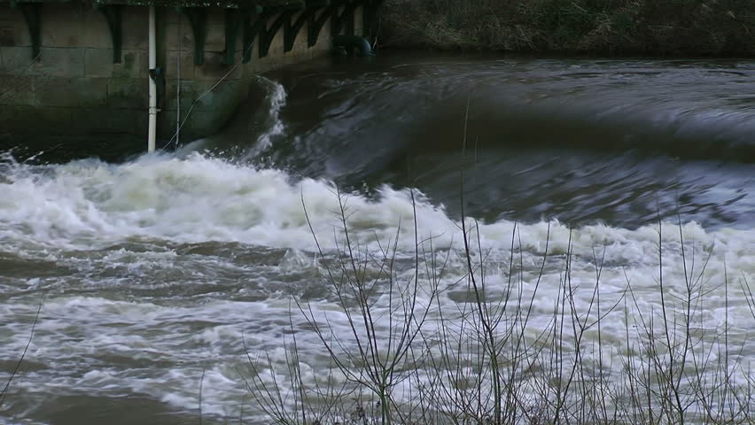 River Torrent
A torrential River rushes over a ridge next to an old Yorkshire Mill