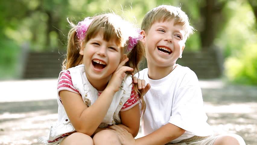 Two child funning in park, outdoors
