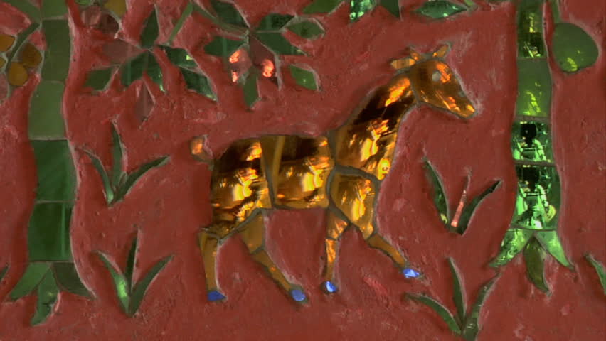 Luang Prabang Laos Lao pan detail of colored glass mosaics in the Royal Funerary Chariot Hall, Wat Xieng Thong temple