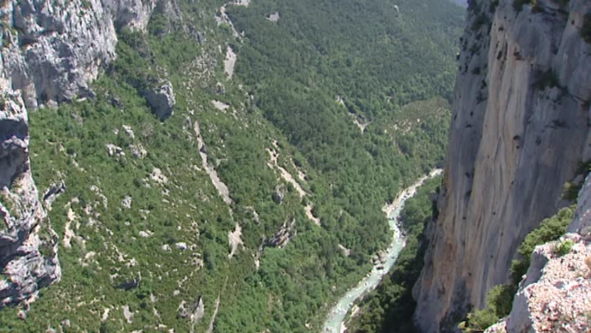 VERDON GORGE, FRANCE: rock wall above Verdon river in canyon + tilt up mountain slope + rocks