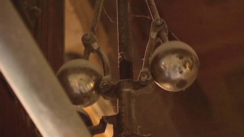 regulator turning  in historical gristmill, frog view