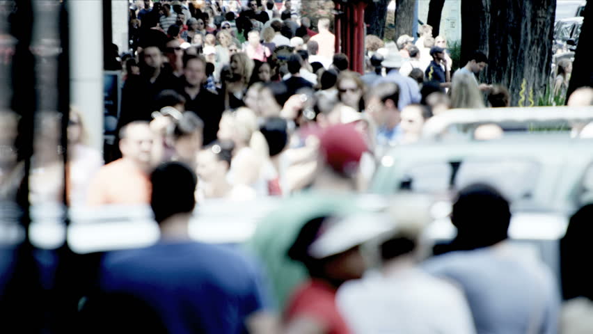 America - August 22, 2012: City population walking on busy sidewalks America, USA 