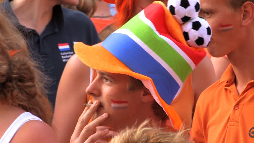 GRONINGEN, HOLLAND - JULY 11: Dutch soccer fans supporting their team during the final of the FIFA World Cup 2010 Netherlands vs. Spain - July 11, 2010 in Groningen, the Netherlands.