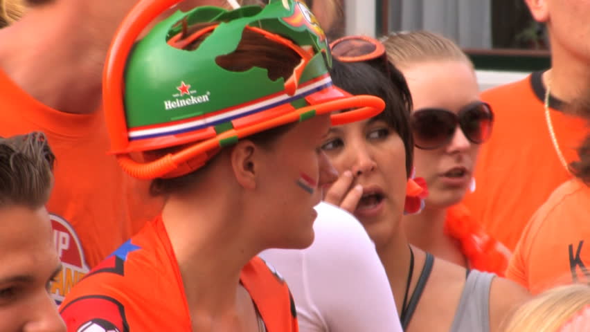 GRONINGEN, HOLLAND - JULY 11: Dutch soccer fans supporting their team during the final of the FIFA World Cup 2010 Netherlands vs. Spain - July 11, 2010 in Groningen, the Netherlands.