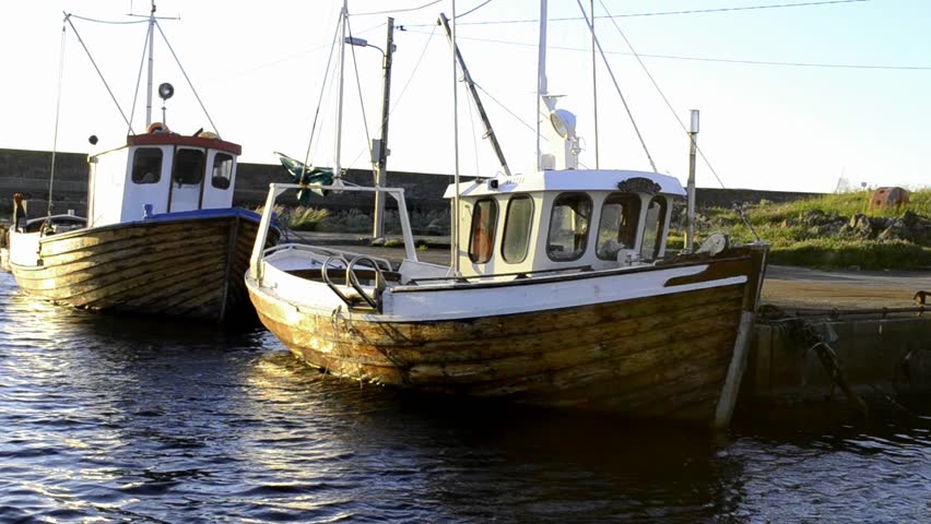 fishing boats in the small harbor in Norway