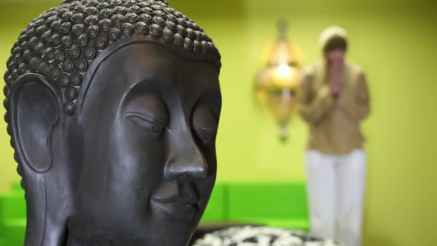 Woman performing yoga at beautiful studio. See more video from Yoga series.Young woman performing yoga at beautiful studio.